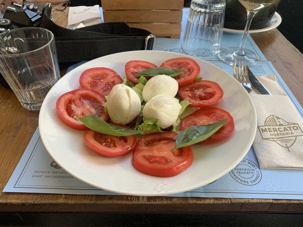 A caprese salad with beautiful fresh mozzarellaripe tomatoes & 