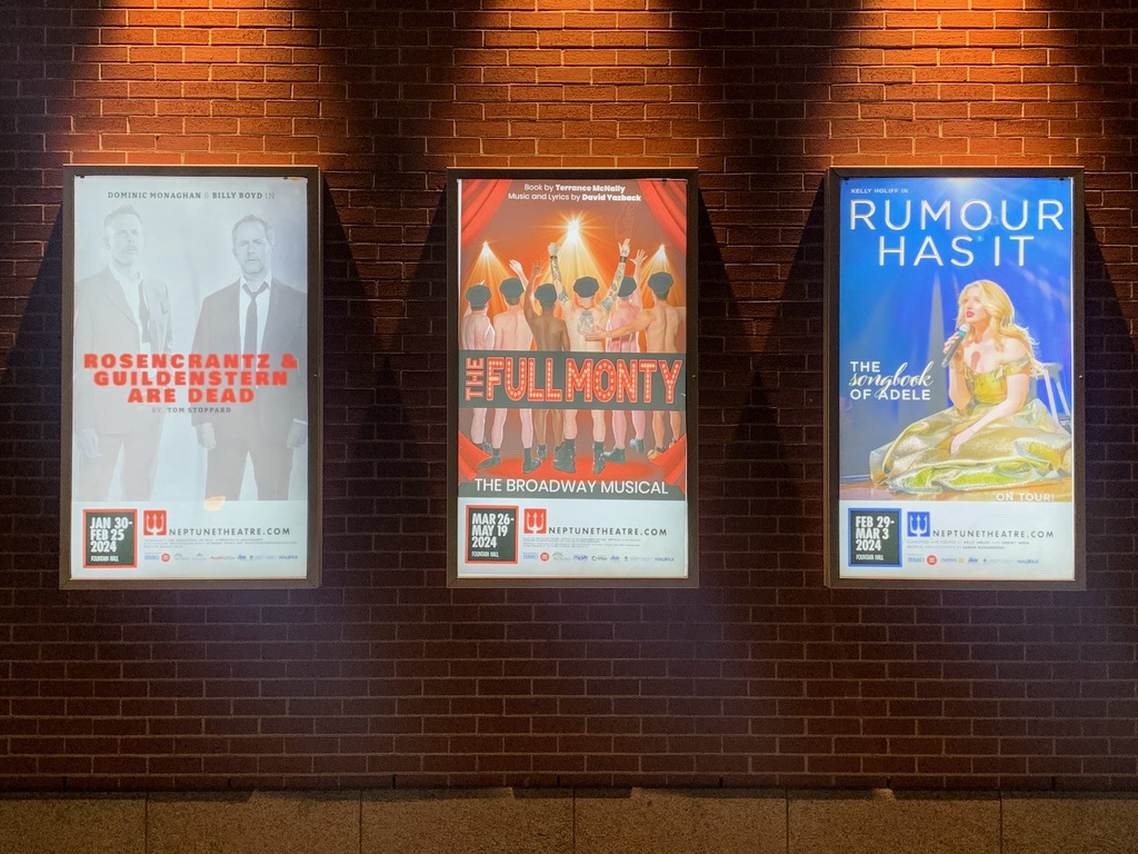 A few show posters outside the Neptune, including R&G