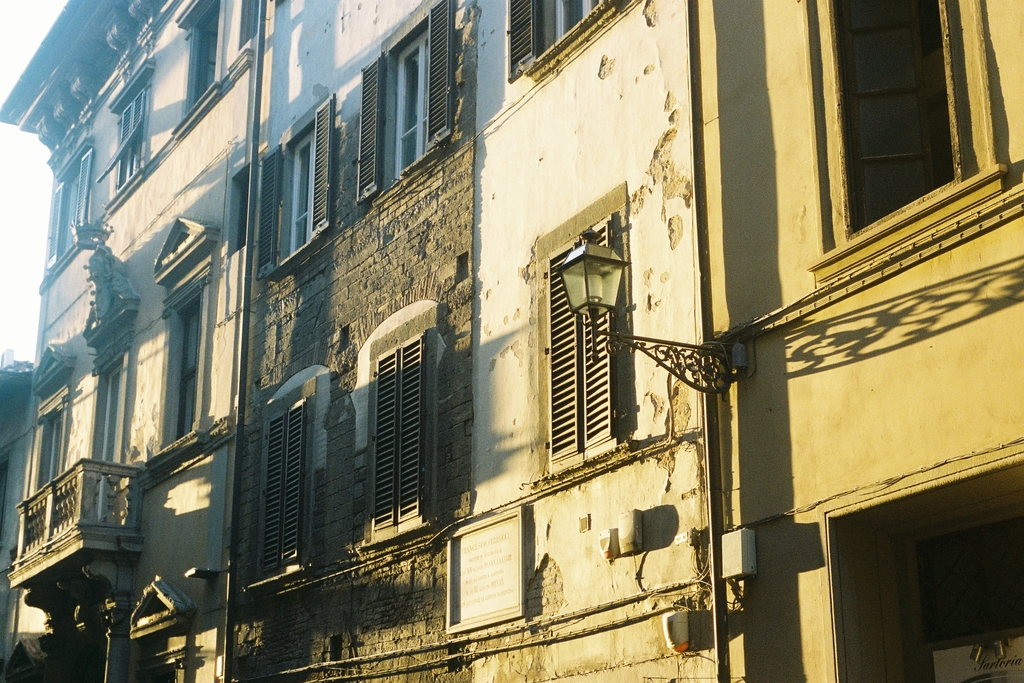 The tall, narrow buildings of Florence, in golden sunset