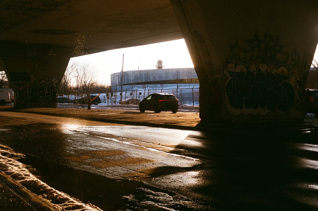 The Saint-Lawrence Warehouse shows under an overpass, which is dripping runoff