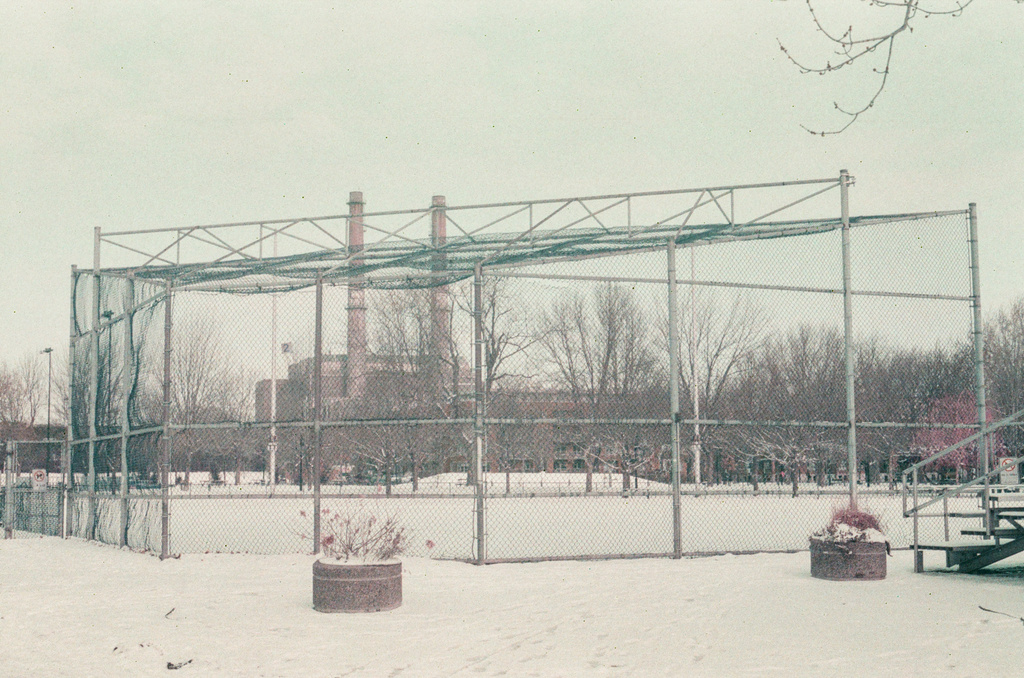 The Des Carrières incinerator, viewed from behind a baseball diamond