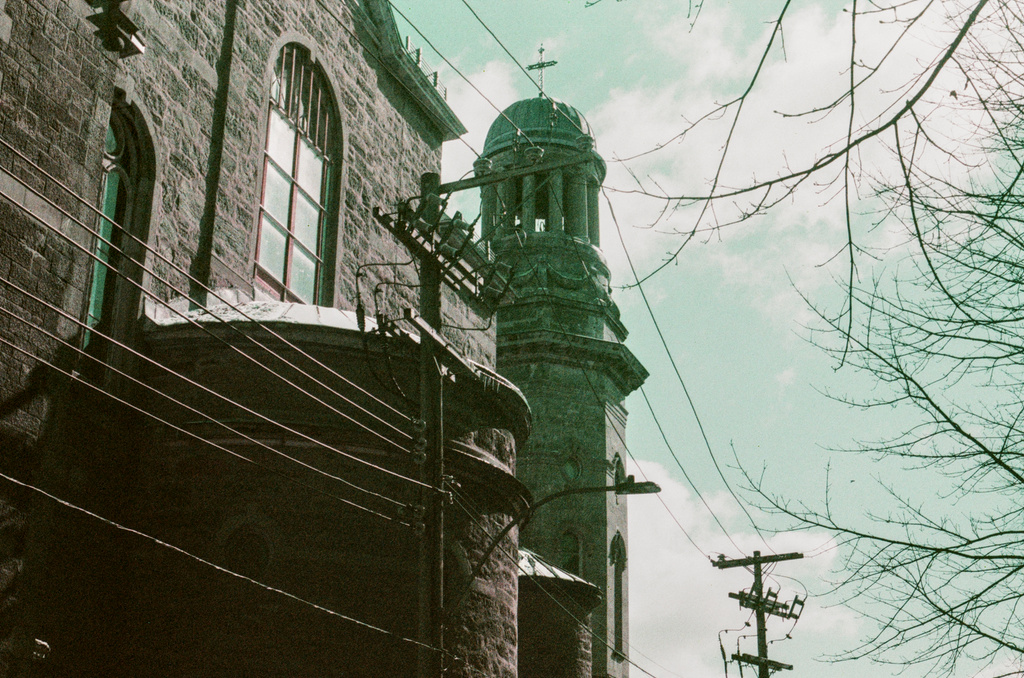 The back side of a church and bell tower
