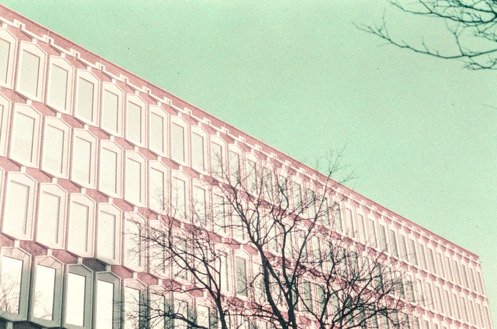 An office building against a clear blue sky
