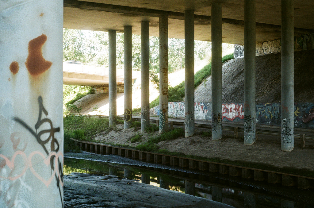 Pillars and an underpass with much graffiti