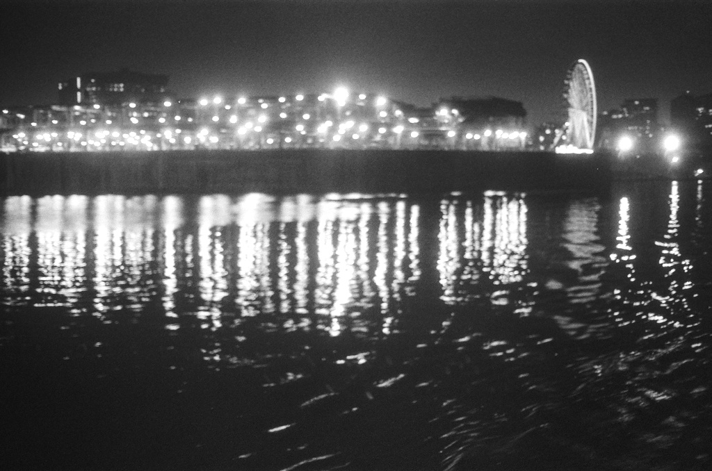 The lights of the Old Port reflect in the water