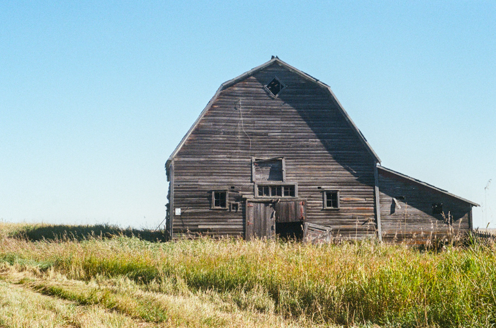 A run-down barn in the prairie
