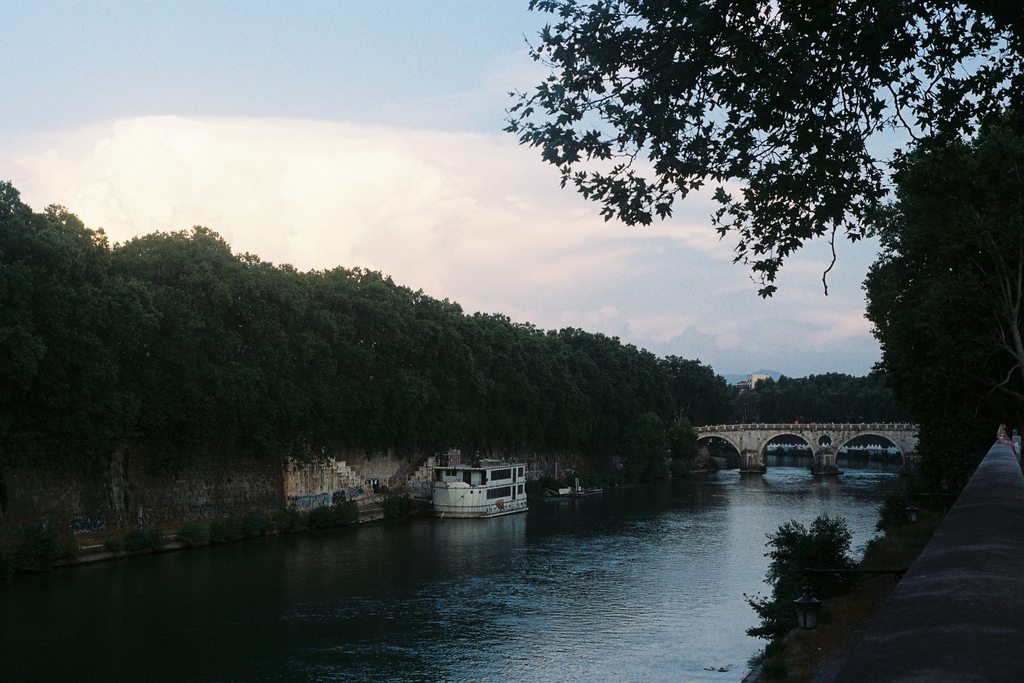 The Tiber in the evening, with clouds gathering in the distance