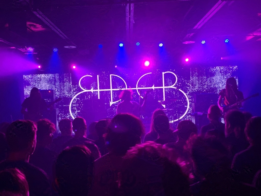 Elder, on stage in the club, killing it