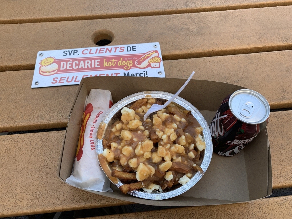 Poutine with cherry cola and hot dog