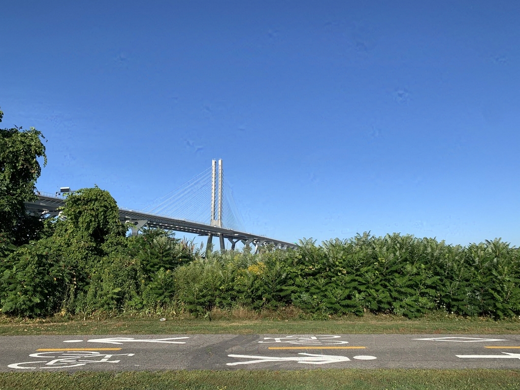 Looking at Champlain Bridge from the bike path below
