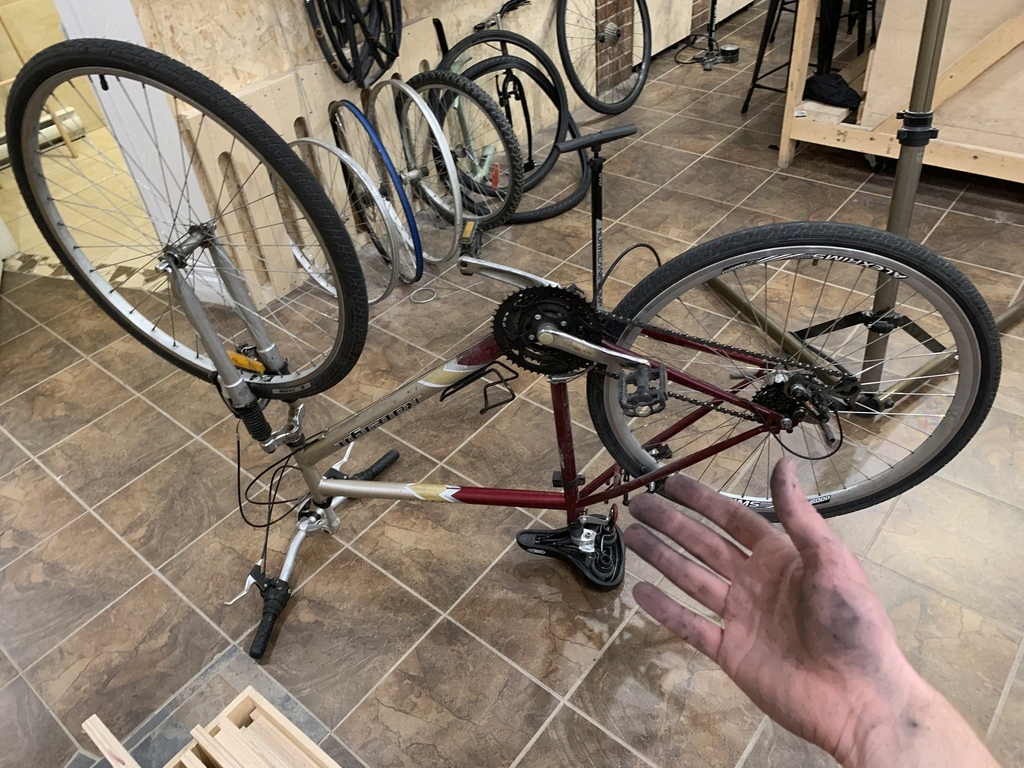 My bike on its back, and my greasy hand